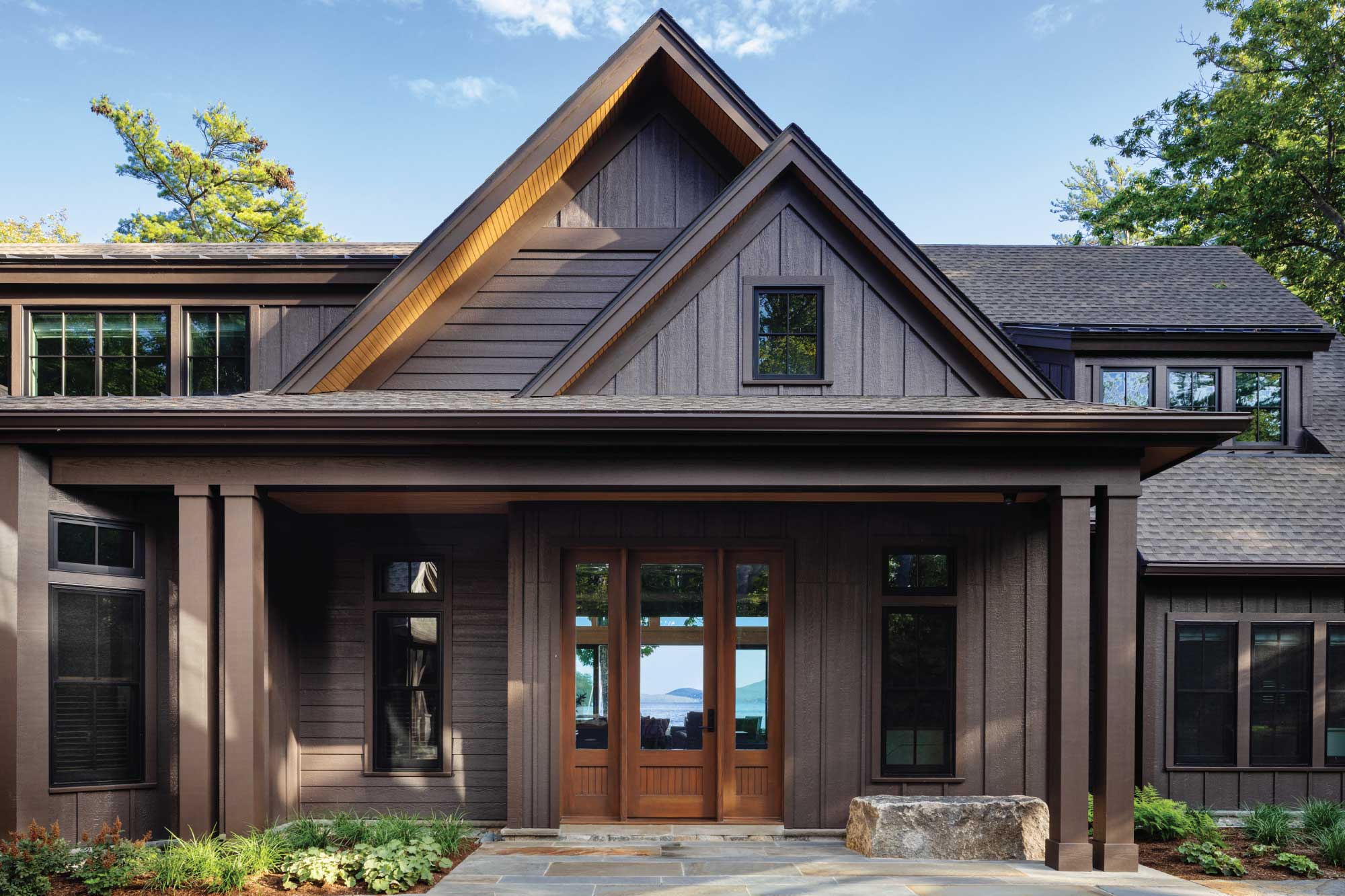 Family Woodland Lakehouse Featured in Modern Luxury Interiors